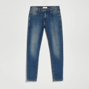 Granatowe jeansy slim fit House