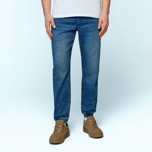 Granatowe joggery jeansowe z przetarciami House