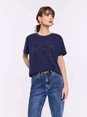 Granatowe spodnie denimowe typu mom jeans TARANKO