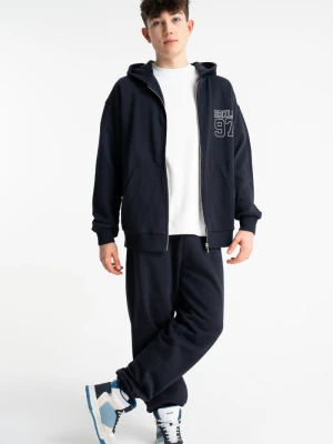 Granatowe spodnie dresowe OVERSIZE bez nadruków Reporter