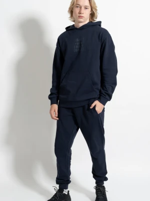 Granatowe spodnie dresowe REGULAR z minimalistycznym nadrukiem z boku Reporter