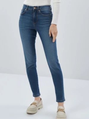 Granatowe spodnie jeansowe damskie OCHNIK