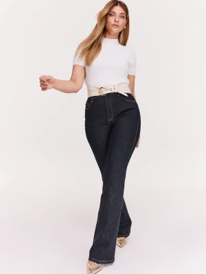 Granatowe spodnie jeansowe typu dzwony TARANKO