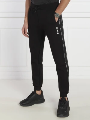 GUESS ACTIVE Spodnie dresowe Mickey | Regular Fit czarny