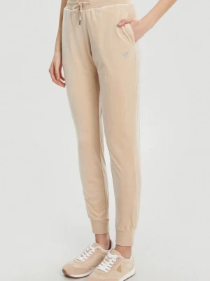 GUESS Beżowe damskie spodnie dresowe Couture, Rozmiar L