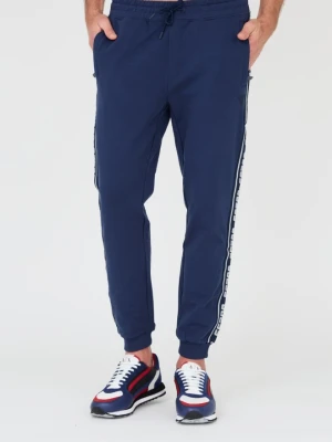 GUESS Granatowe męskie spodnie, Rozmiar M