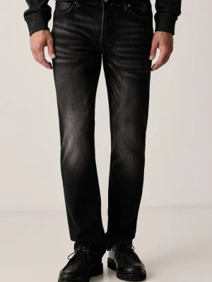 Guess jeansy slim taper męskie FINNLEY czarny