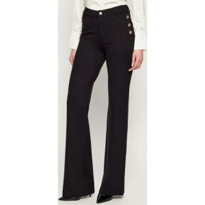 GUESS Spodnie CHRISSY | flare fit