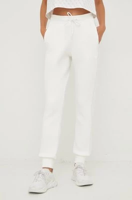 Guess spodnie dresowe ALLIE damskie kolor beżowy z aplikacją V2YB18 K7UW2