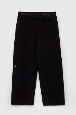 Guess spodnie dresowe dziecięce kolor czarny gładkie