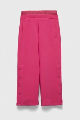 Guess spodnie dresowe dziecięce kolor różowy gładkie