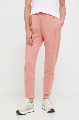Guess spodnie dresowe kolor różowy gładkie