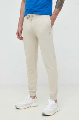Guess spodnie dresowe ALDWIN męskie kolor beżowy gładkie Z2YB22 KAIJ1