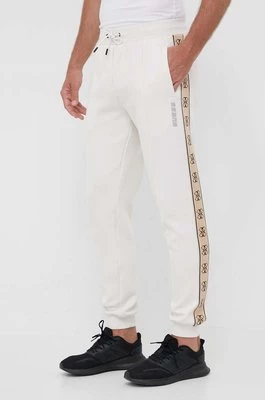 Guess spodnie dresowe MICKEY męskie kolor beżowy z nadrukiem Z2YB09 KB3P2