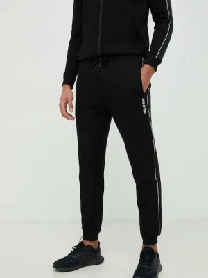 Guess spodnie dresowe MICKEY