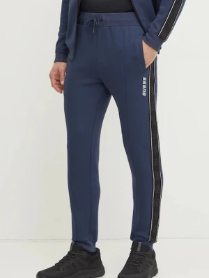 Guess spodnie dresowe MICKEY