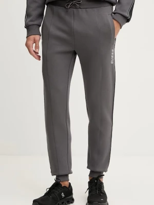 Guess spodnie dresowe MICKEY