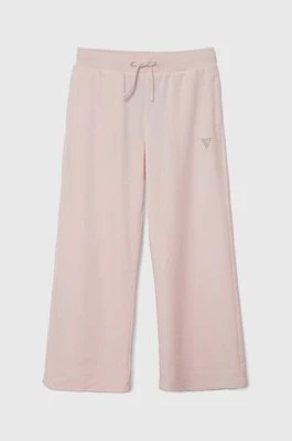 Guess spodnie dresowe welurowe dziecięce kolor różowy gładkie