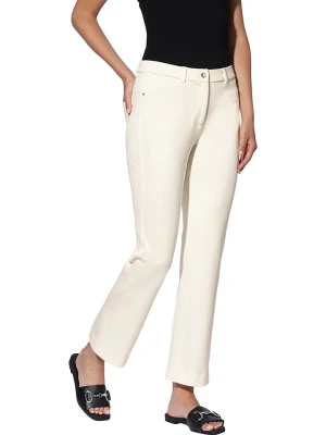 Heine Spodnie chino w kolorze kremowym rozmiar: 36