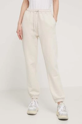 Herschel spodnie dresowe bawełniane kolor beżowy gładkie