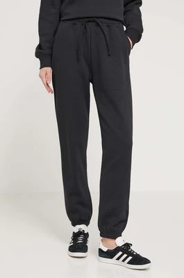 Herschel spodnie dresowe bawełniane kolor czarny gładkie