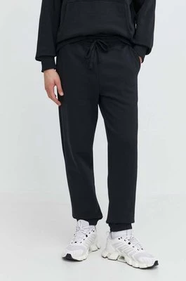 Herschel spodnie dresowe bawełniane kolor czarny gładkie