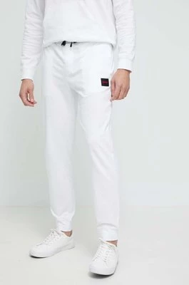 HUGO spodnie bawełniane lounge kolor biały z nadrukiem
