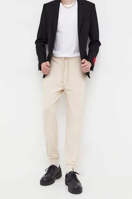 HUGO spodnie dresowe bawełniane kolor beżowy gładkie 50489617