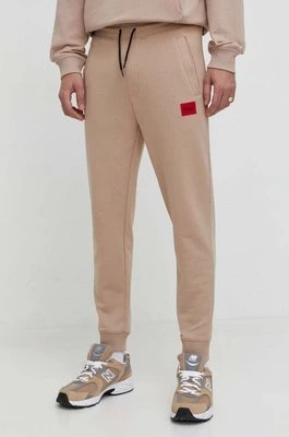 HUGO spodnie dresowe bawełniane kolor beżowy melanżowe 50447963
