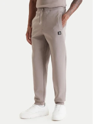 HUGO Spodnie dresowe Dimacs 50533695 Beżowy Relaxed Fit