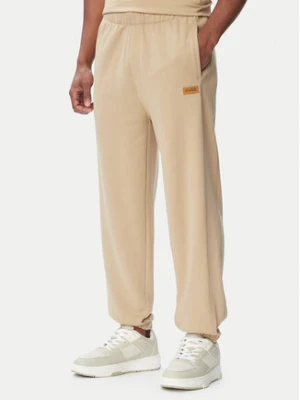 HUGO Spodnie dresowe Nevatro 50564047 Beżowy Regular Fit