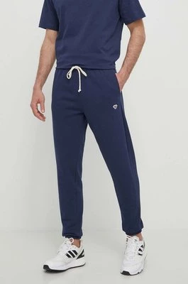 Hummel spodnie dresowe kolor niebieski gładkie