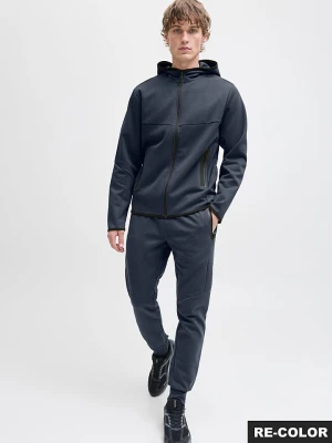 Jack & Jones Spodnie dresowe "Stwill" w kolorze granatowym rozmiar: M
