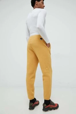 Jack Wolfskin spodnie dresowe męskie kolor żółty