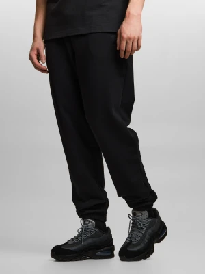 Jacquard Label spodnie dresowe oversize bawełniane czarne Klasyk