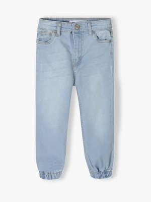 Jasne spodnie jeansowe typu joggery dziewczęce Minoti