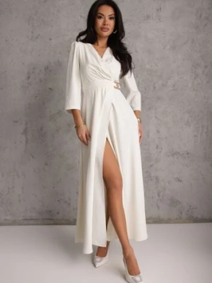 Jasnobeżowa Elegancka Sukienka o Kopertowym Kroju Zdobiona Aplikacją w Talii Zilendra vices