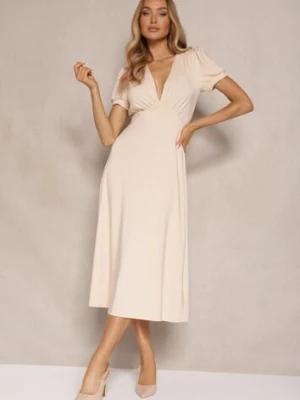 Jasnobeżowa Rozkloszowana Sukienka z Wiskozą Koktajlowa z Poduszkami w Ramionach Mimiza by swan