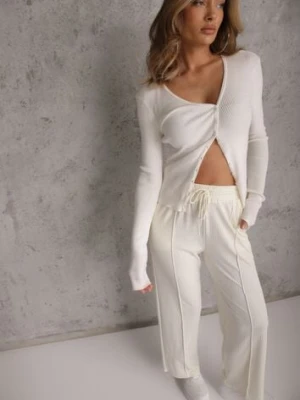 Jasnobeżowe Prążkowane Spodnie High Waist z Szerokimi Nogawkami Ginorria glo-story