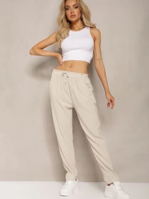 Jasnobeżowe Spodnie z Regularną Talią z Gumką i Sznurkiem w Pasie Cerinda dbt fashion