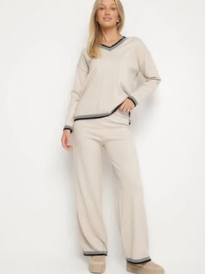 Jasnobeżowy Dzianinowy Komplet z Ozdobną Lamówką Sweter i Szerokie Spodnie Ralenae glo-story