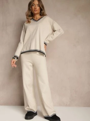 Jasnobeżowy Komplet Dzianinowy Sweter i Spodnie Wide Leg z Ozdobną Lamówką Ralenia glo-story