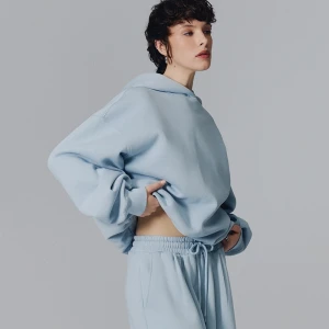 Jasnoniebieska bluza bombka z kapturem House