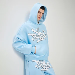 Jasnoniebieska bluza z kapturem i nadrukiem Tribe w stylu graffiti House