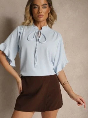 Jasnoniebieska Bluzka z Falbanami i Wiązaniem Fadeassa j studio