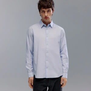 Jasnoniebieska koszula z długim rękawem House