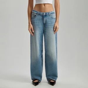 Zdjęcie produktu Jasnoniebieskie jeansy baggy fit mid waist House