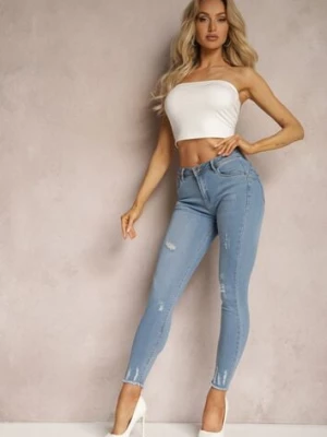 Jasnoniebieskie Jeansy Modelujące Push Up Ozdobione Przedarciami Qandara