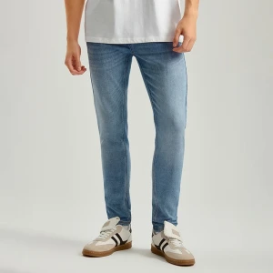 Zdjęcie produktu Jasnoniebieskie jeansy skinny fit z efektem sprania House