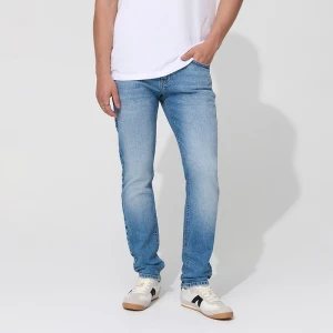 Jasnoniebieskie jeansy slim fit z efektem sprania House